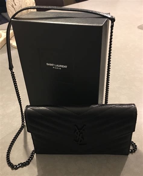 ysl chain wallet in black leather|YSL wallet on chain used.